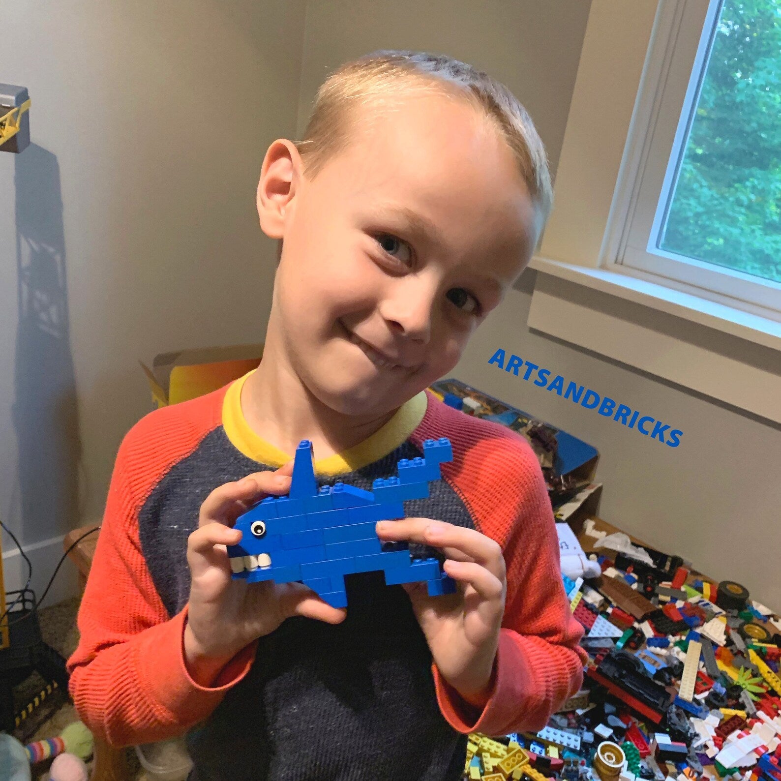 Brick - Built Shark is a Brick Built Colorful Sticker (blue, brick art, brick - built) from the Arts and Bricks brand by Barkhurst Creative